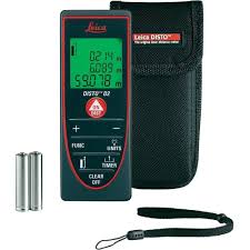 Technician checking a handheld distance meter during calibration