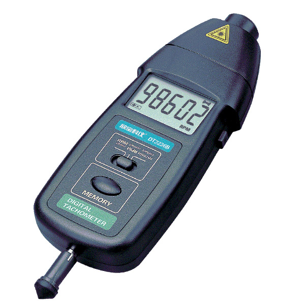 Technician performing inspection work for a tachometer measurement device