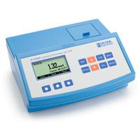 Technician handling an environmental testing instrument used for COD measurement service and maintenance